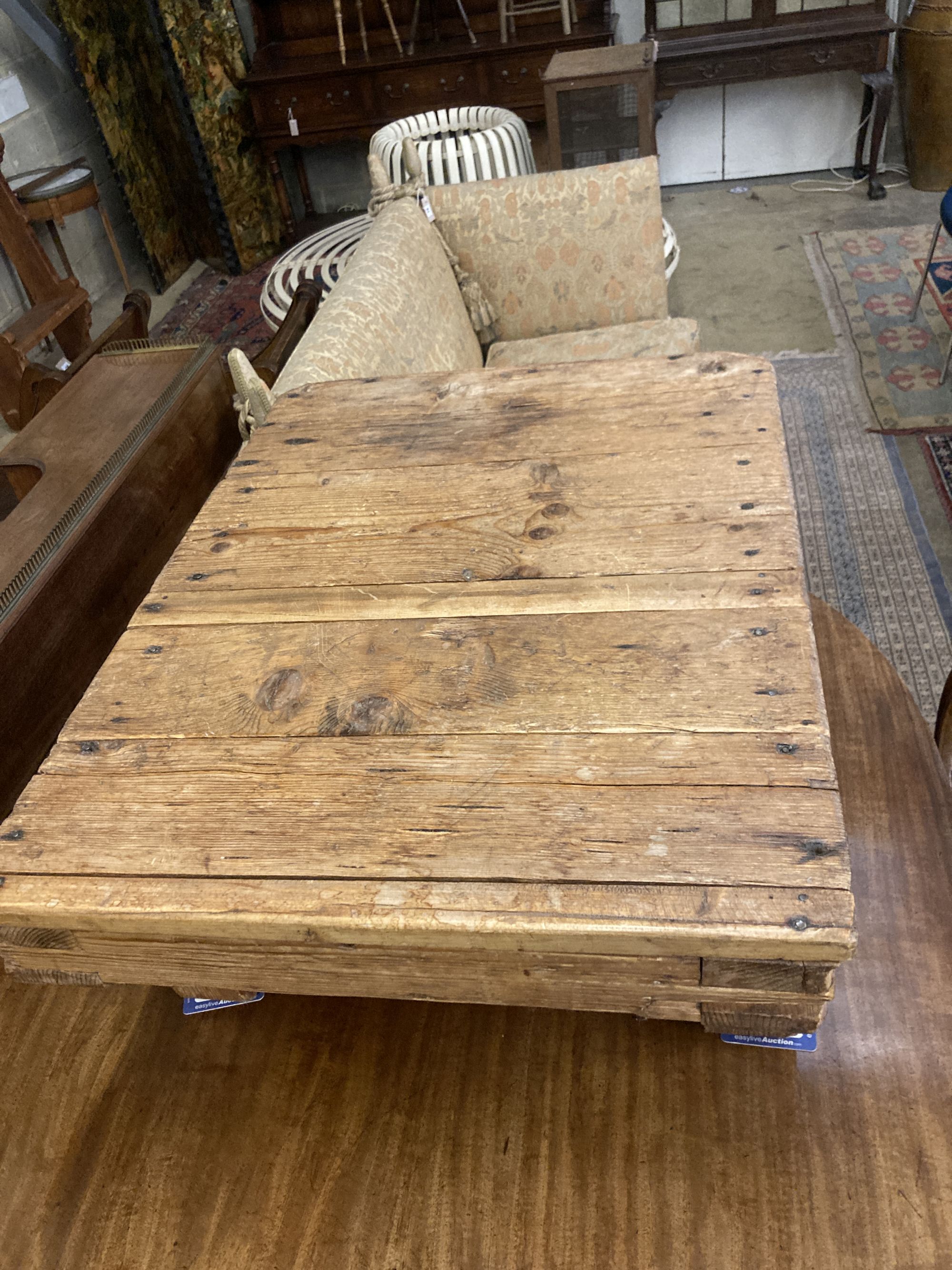 A 19th century provincial pine low dairy table, width 94cm depth 71cm height 39cm